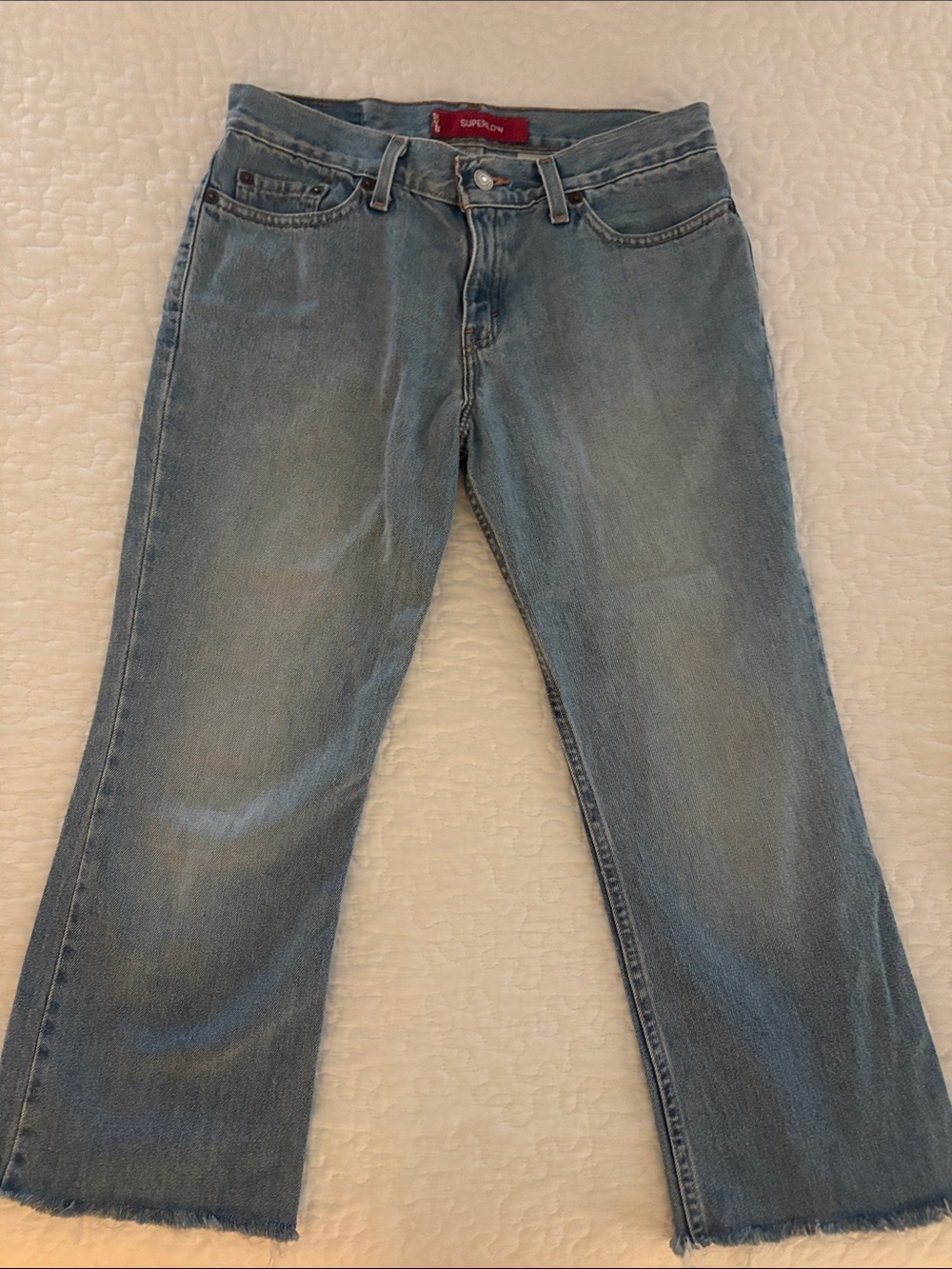 Levi's Women's Light Blue Cropped Ankle Jeans with Raw Hem